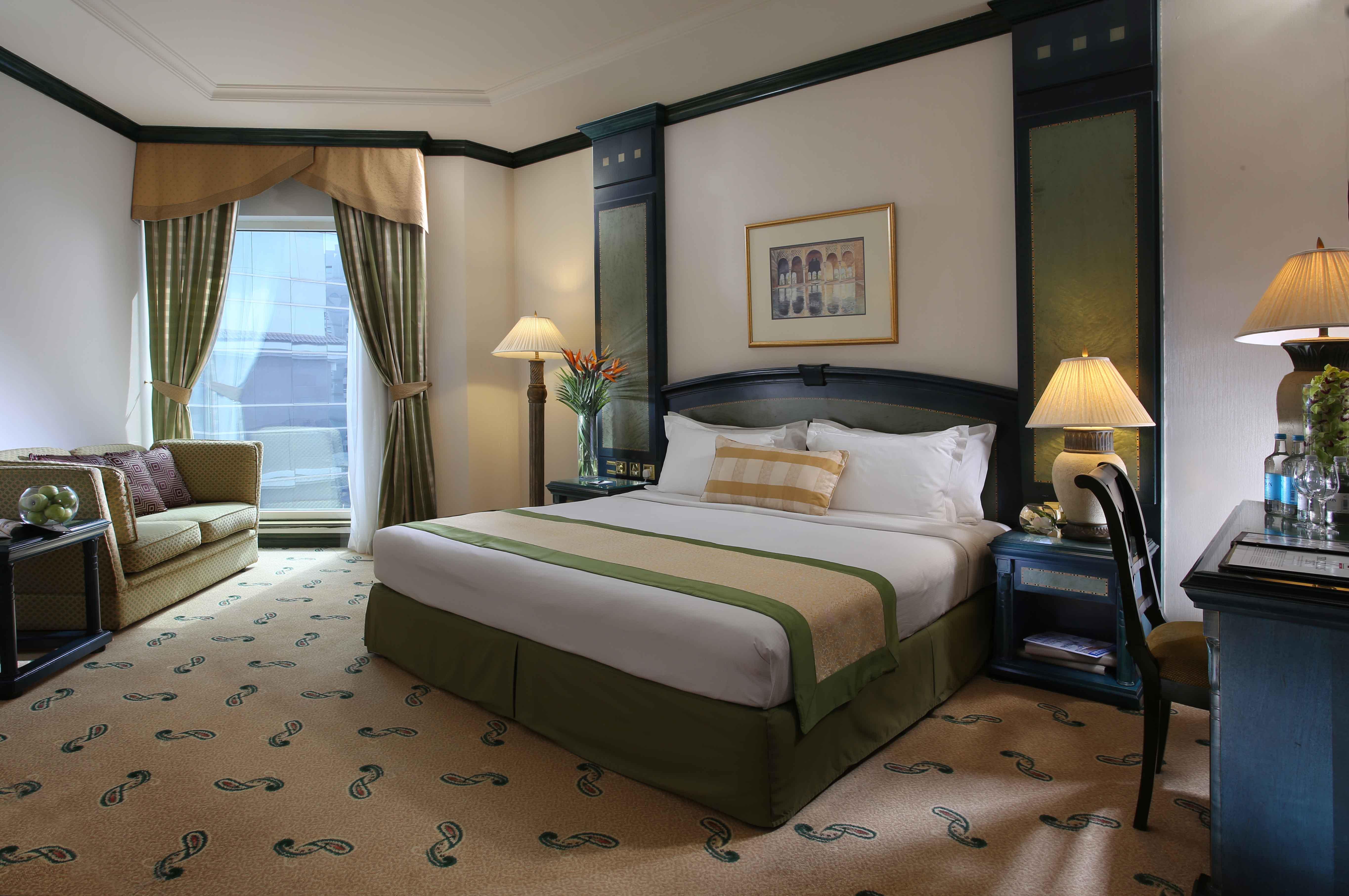 โรงแรมคาร์ลตัน พาเลซ ดูไบ ภายนอก รูปภาพ A room at the hotel