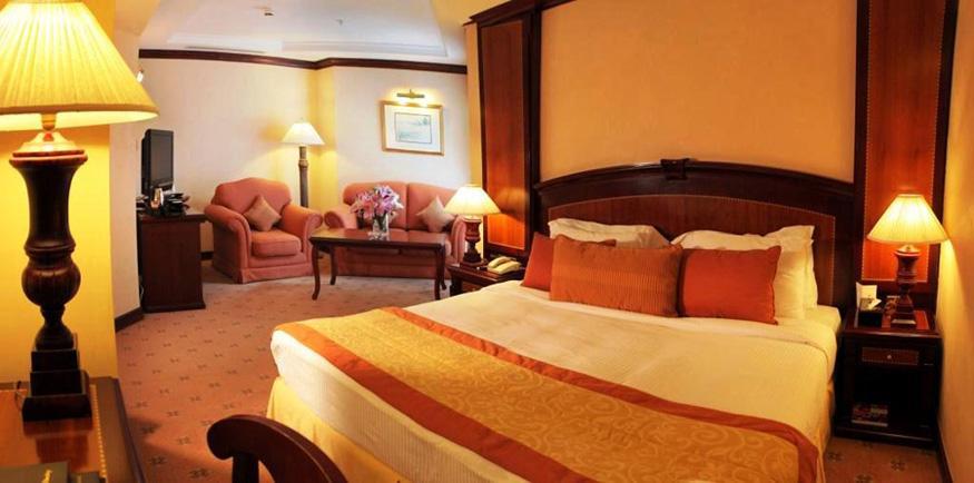 โรงแรมคาร์ลตัน พาเลซ ดูไบ ภายนอก รูปภาพ A room at the hotel