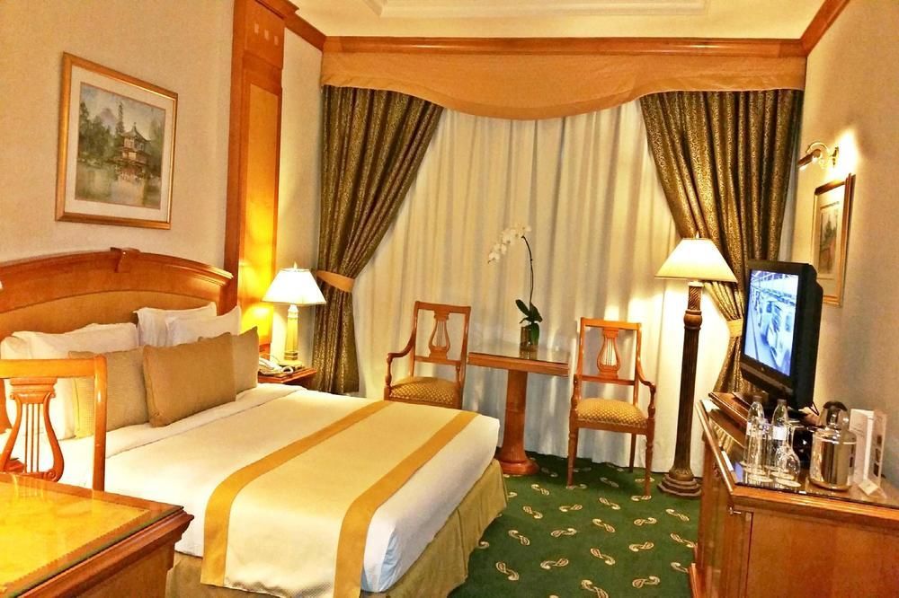 โรงแรมคาร์ลตัน พาเลซ ดูไบ ภายนอก รูปภาพ A room at the hotel