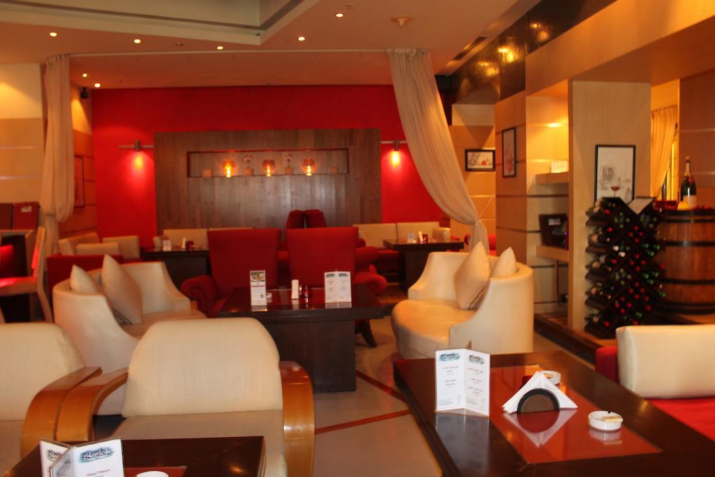 โรงแรมคาร์ลตัน พาเลซ ดูไบ ภายนอก รูปภาพ The lounge at the airport