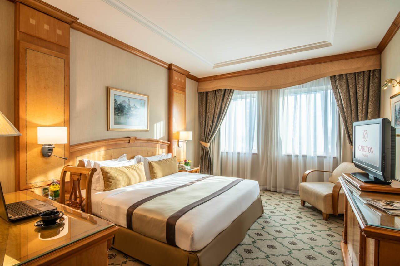 โรงแรมคาร์ลตัน พาเลซ ดูไบ ภายนอก รูปภาพ A room at the hotel